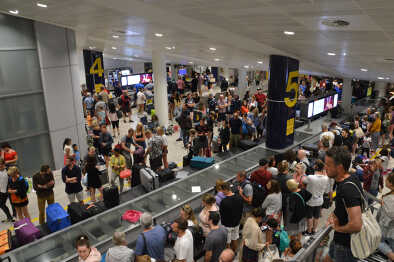Chaos at Manchester airport T3 where an earlier evacuation caused baggage reclaim waiting times to exceed 4 hours. Hundreds of stranded passengers with no bags Chaos at Manchester airport T3 where an earlier evacuation caused baggage reclaim waiting times to exceed 4 hours. Hundreds of stranded passengers with no bags