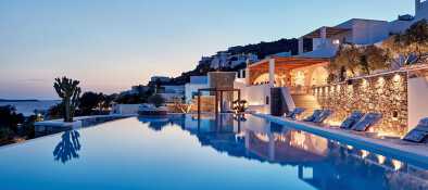 a pool in front of the mediterranean sea