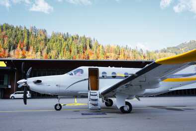 Private jet in an autumn background