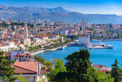 A panoramic view of Split, Croatia, with its picturesque coastline, historic landmarks, and inviting blue waters, an ideal spot for private jet charter.